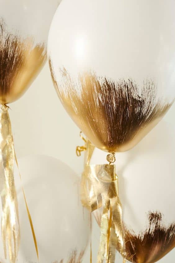 What isn’t made more beautiful and special with a splash of gilded gold? These balloons certainly sophisticated, in an abstract, modern way. (Well, as sophisticated as balloons can get, anyway). Simply grab your white helium-filled balloons, a chip brush, and some gold paint (recommended: liquid gold leaf, or gold enamel paint), and go to town with quick, upward strokes. Just paint the bottom 1/3 of the balloon.{found on potterybarnkids}.